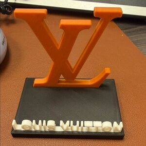 Louis Vuitton Orange and Black Logo Decor